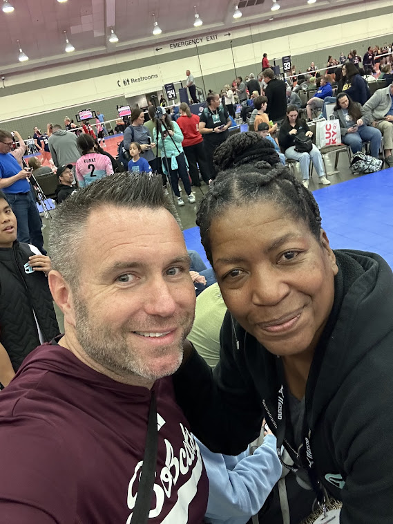 That's me Coach April with my friend and fellow coach Sean Huiet who took over as head coach of the Bobcat volleyball program in 2020 after spending 14 seasons as the assistant/associate head coach. In four seasons at the helm of the program, Huiet has accumulated a 95-38 overall record and 55-9 mark in Sun Belt Conference matches.