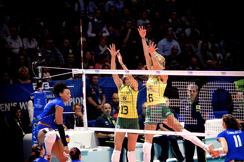 The Brazilian women's team has also left an indelible mark on the FIVB World Championship tournament, with their powerful gameplay and strategic prowess, winning numerous titles, including back-to-back championships in 2002 and 2006.
<br><a href="https://commons.wikimedia.org/wiki/File:Mondiali_di_pallavolo_2014_(15002551313).jpg">Massimiliano Raposio</a>, <a href="https://creativecommons.org/licenses/by-sa/2.0">CC BY-SA 2.0</a>, via Wikimedia Commons<br>