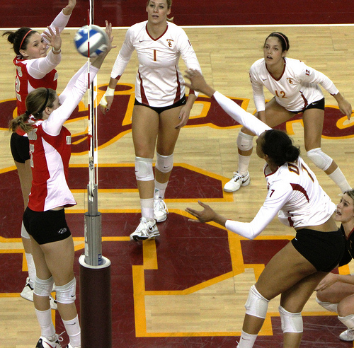 While blocking in volleyball a player can't touch the net on the way up or on the way down with any parts of the body while the ball is in play. (Neon Tommy)