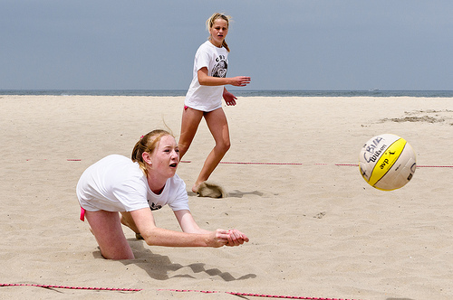 Pass A Volleyball: As you and your partner's ability to pass a volleyball on the sand improves, then both of you can make adjustments to your ideal serve receive target area. (Ralph Aversen)