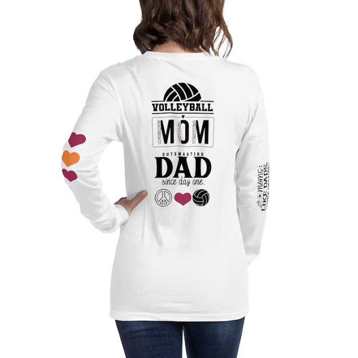 "Volleyball mom outsmarting dad since day one". These “Peace Love Volleyball” shirts are more than just apparel; they are a source of motivation for the moms of volleyball players. Each shirt features quotes designed to remind the wearer to maintain a positive outlook, even during challenging practices or tournament days.