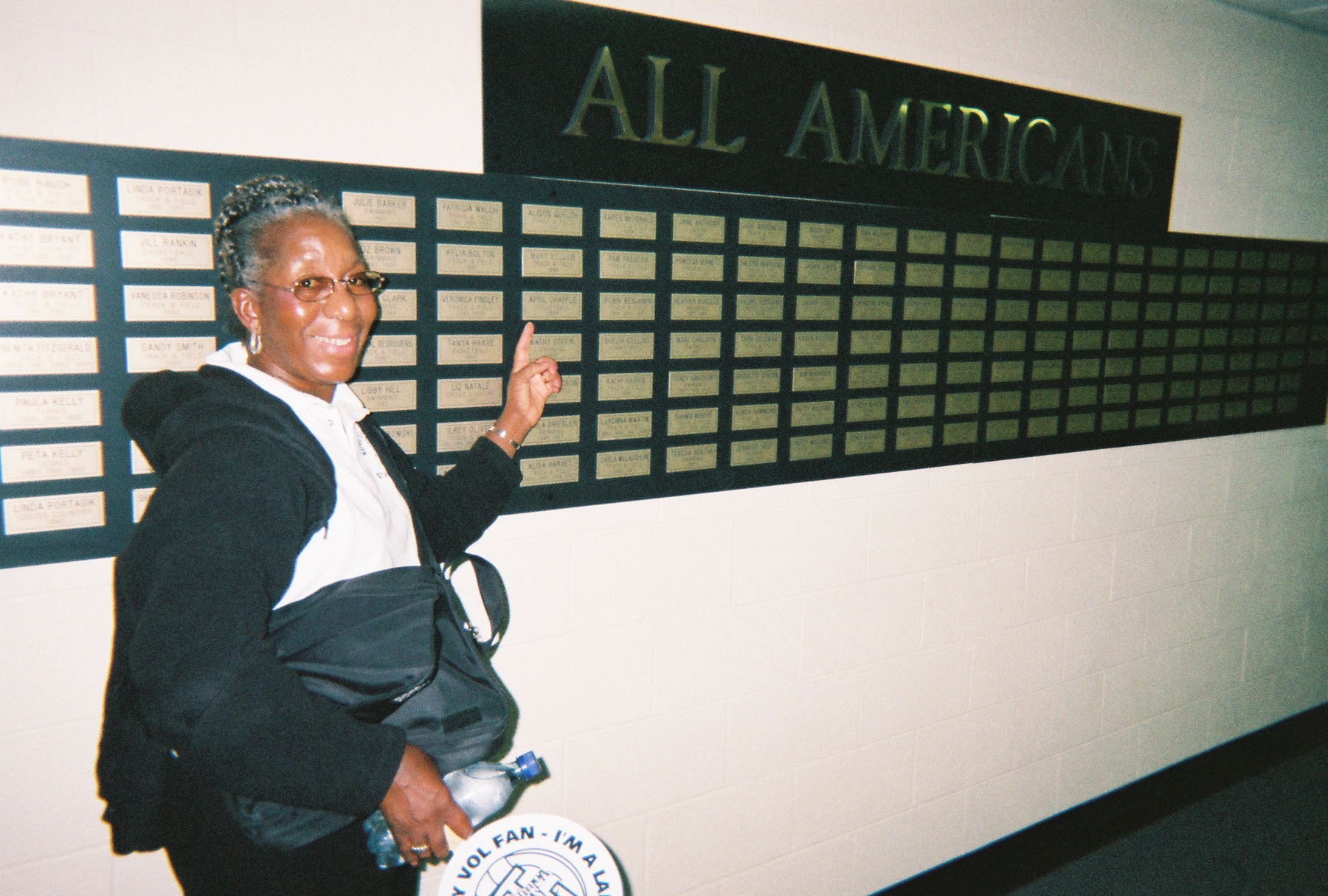 My mom pointing to one of my All American plaques in the All American Hall at the University of Tennessee, Knoxville. Rest in peace Gal Sal.