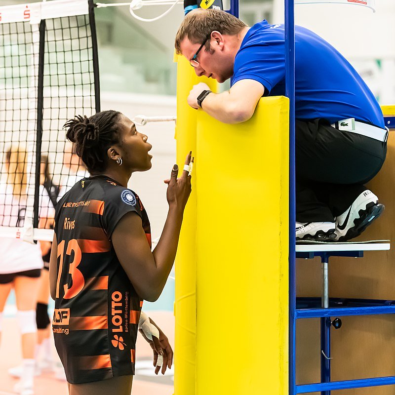 The first referee, aka the first official aka the 'up" referee

starts the match
judges each play and
calls the technical fouls
assigns points and side outs
as they occur to each qualifying team and also makes the final decision on questionable plays