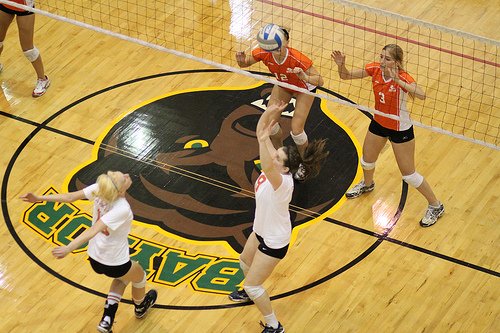 Lets go behind the scenes at college volleyball photo shoot day.