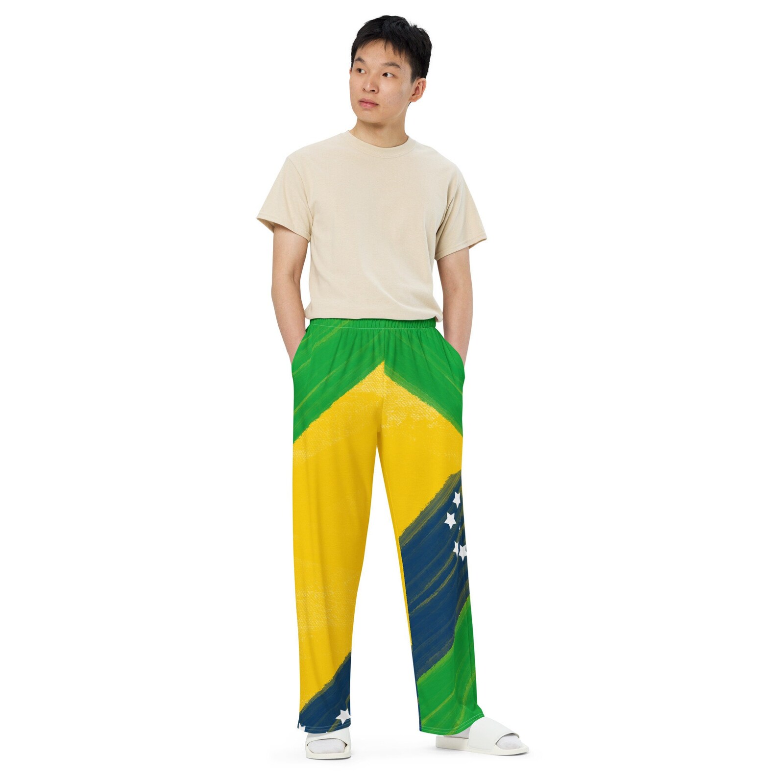 Now you know you want you some of these! Shop Brazilian flag inspired paint splatter and tie dye wide leg pants! This you?