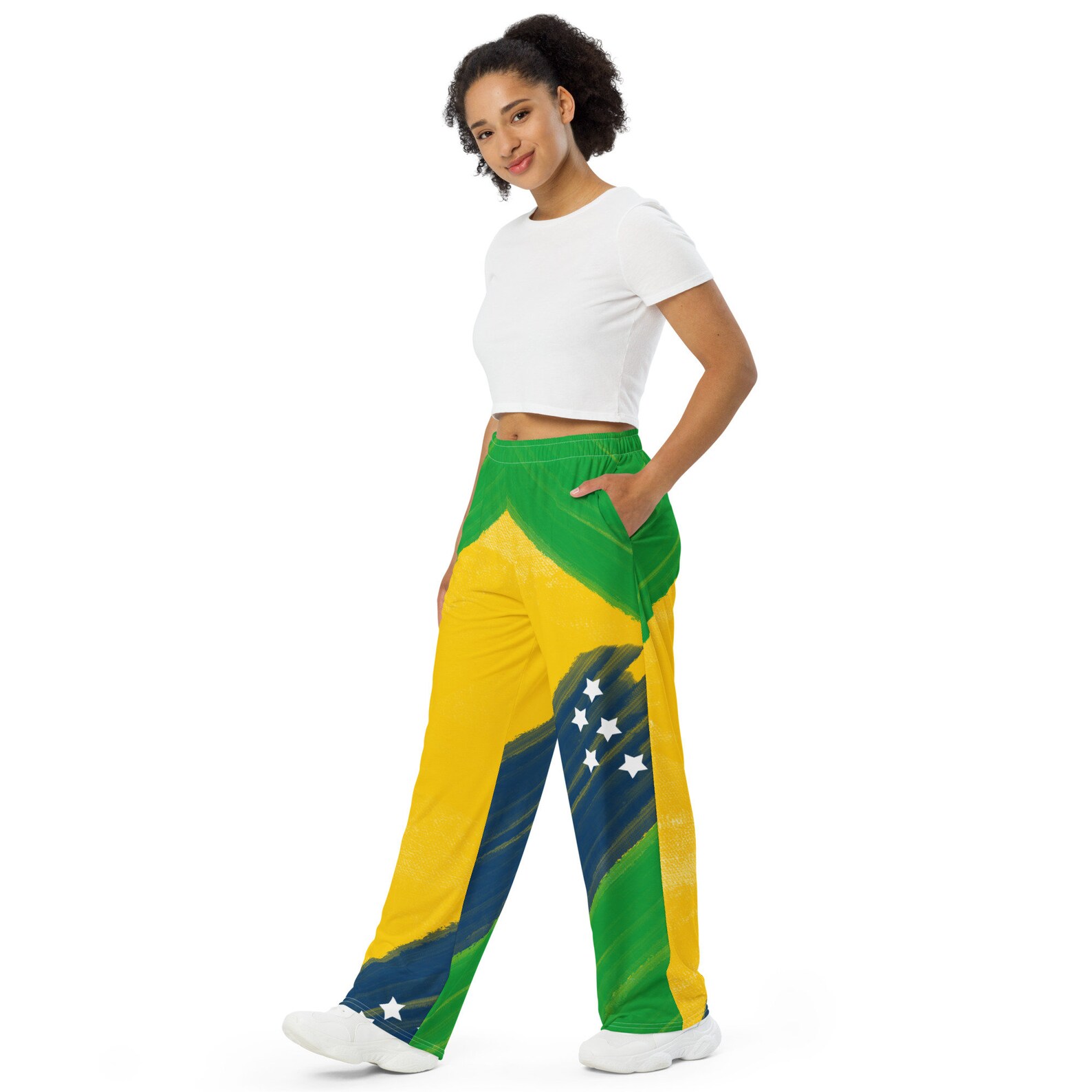 Now you know you want you some of these! Shop Brazilian flag inspired paint splatter and tie dye wide leg pants! This you?