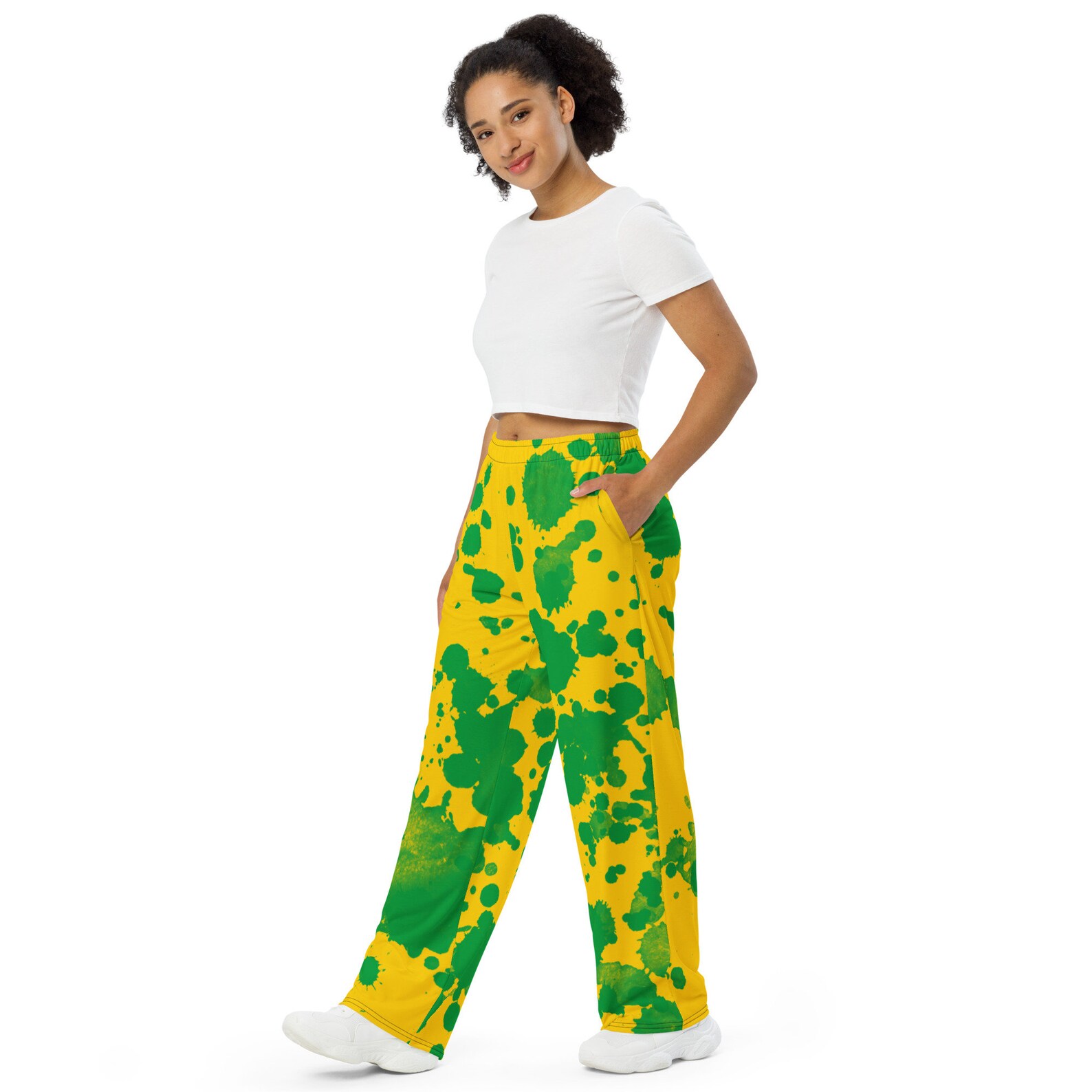 Now you know you want you some of these! Shop Brazilian flag inspired paint splatter and tie dye wide leg pants! This you?