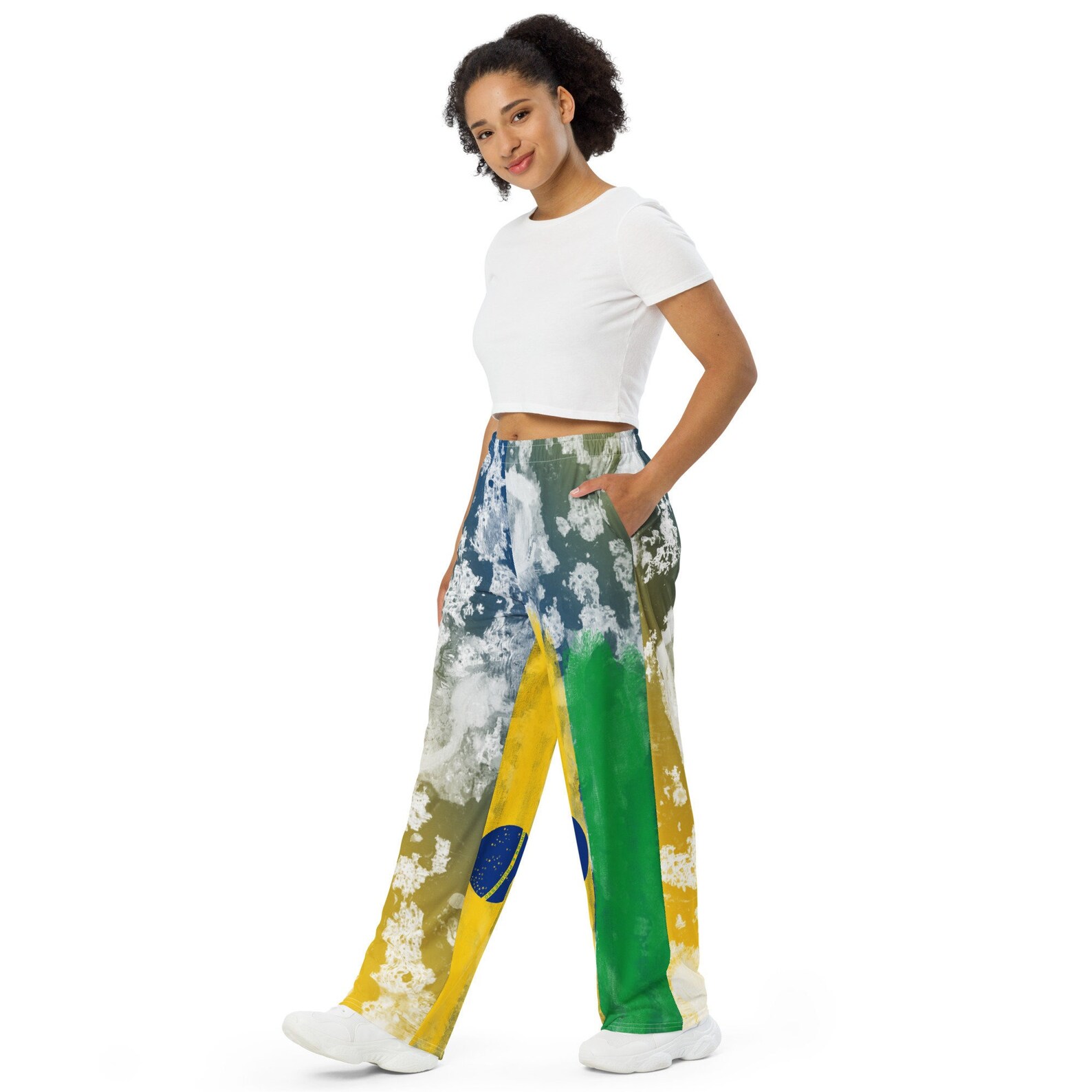 Now you know you want you some of these! Shop Brazilian flag inspired paint splatter and tie dye wide leg pants! This you?