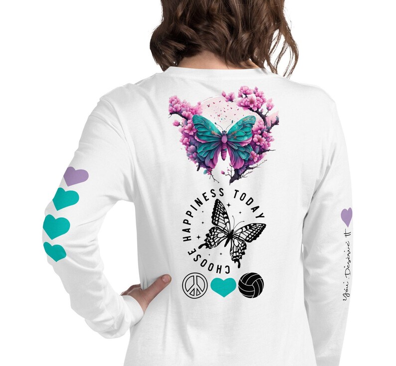 The butterfly, a design element on my volleyball mom shirts symbolizes transformation and strength and serves as a reminder for moms to embrace their challenges.