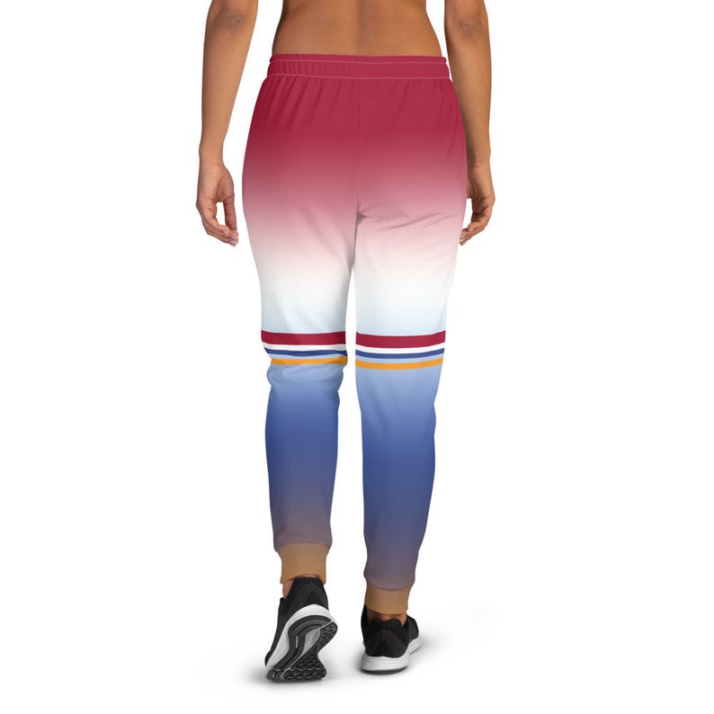 You can create cute outfits with sweatpants inspired by the Tokyo Olympics World flags...Click to shop these fun Dutch flag inspired joggers on the Volleybragswag Etsy shop now!