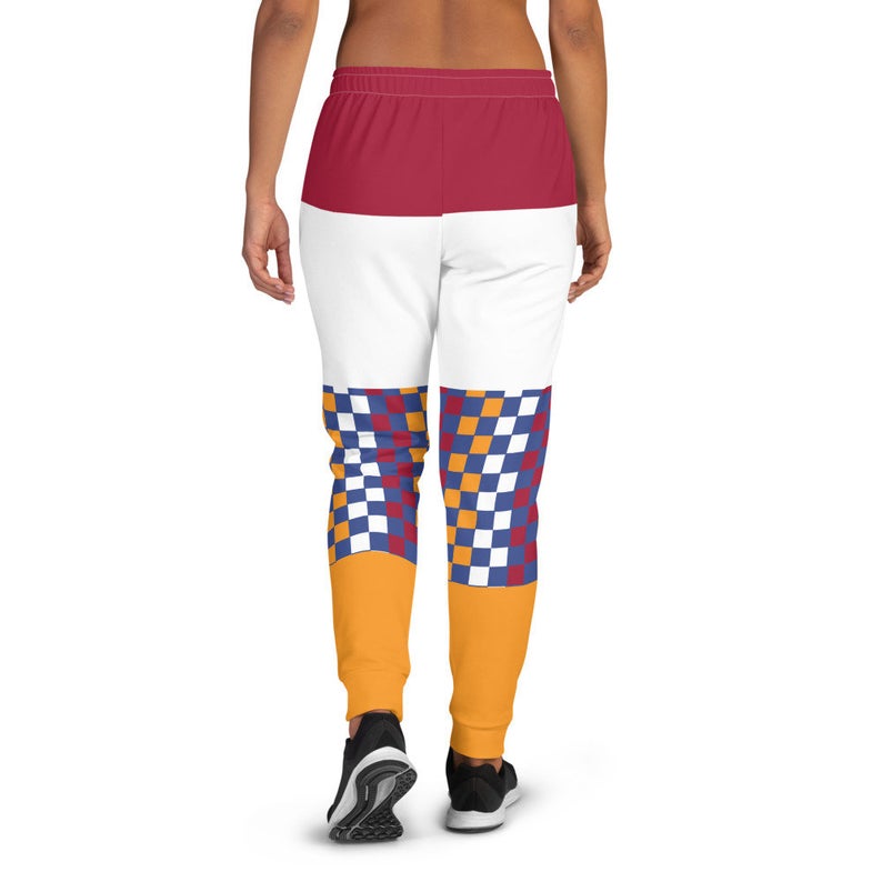 You can create cute outfits with sweatpants inspired by the Tokyo Olympics World flags...Click to shop these fun Dutch flag inspired joggers on the Volleybragswag Etsy shop now!