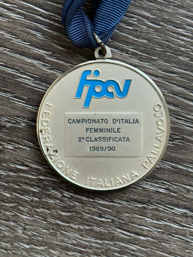 Together while playing with Paula I became one of a handful of American women who has EVER played in the championship finals of the D-I Italian championships, the championship finals of the European championships (CEV) and the championship finals of the Italian Cup. (Pictured Second place medal Championship Finals FIPAV - Italian Fedeation of Volleyball)