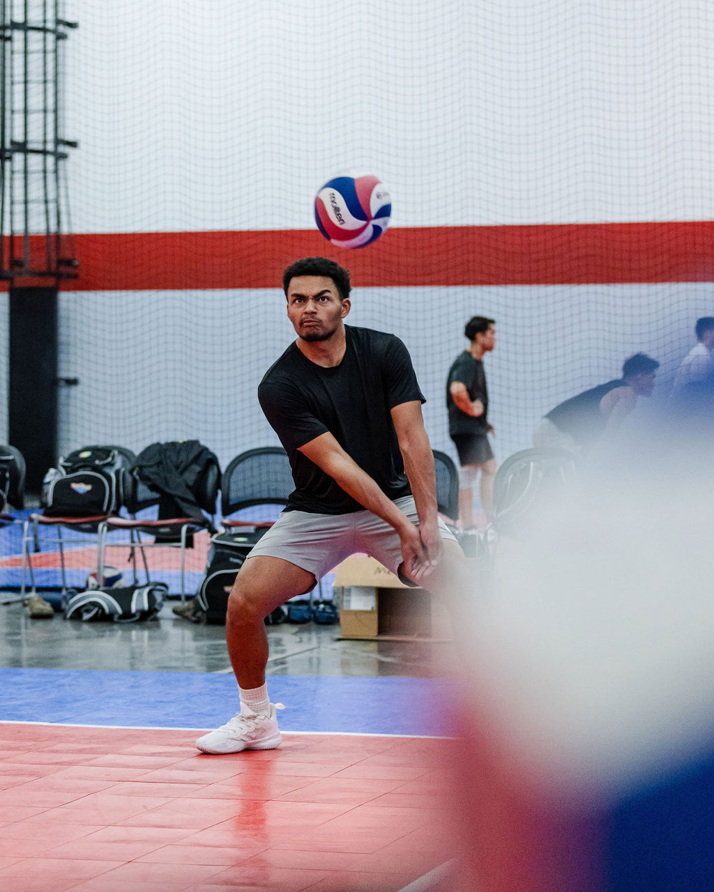 A volleyball passing platform refers to the area on your forearms used to contact, control, and guide balls that are below your waist.